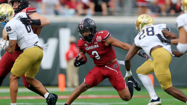 South Carolina Gamecocks wide receiver Antwane Wells Jr. (3) rushes for yards against Notre Dame Fighting Irish cornerback TaRiq Bracy (28) during the first quarter of the TaxSlayer Gator Bowl of an NCAA college football game Friday, Dec. 30, 2022 at TIAA Bank Field in Jacksonville. The Notre Dame Fighting Irish held off the South Carolina Gamecocks 45-38. [Corey Perrine/Florida Times-Union] Jki 123022 Ncaaf Nd Usc Cp 71  